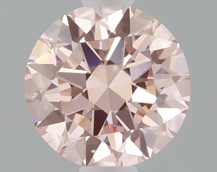 0.69 carat fancy intense pink round lab grown diamond VS1 clarity