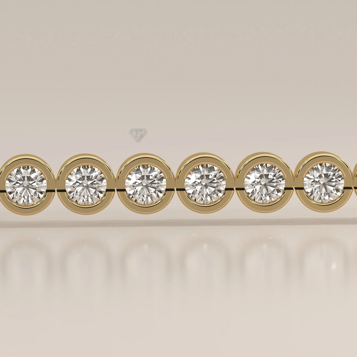 A yellow gold bracelet with round bezel-set diamonds