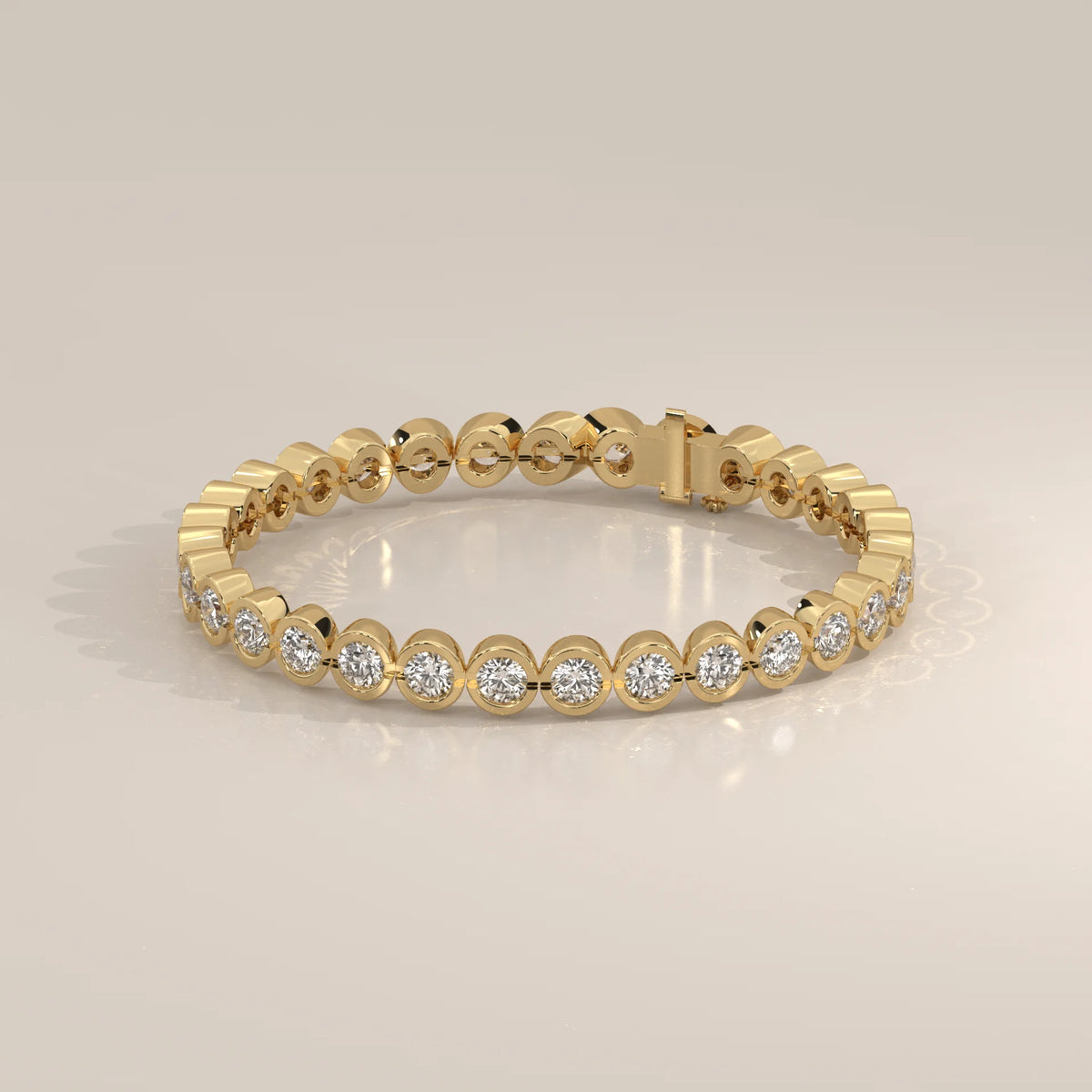 A classic 14k gold bracelet with bezel-set round diamonds.