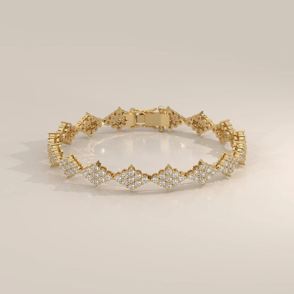 A delicate gold bracelet adorned with sparkling diamonds in a geometric pattern.