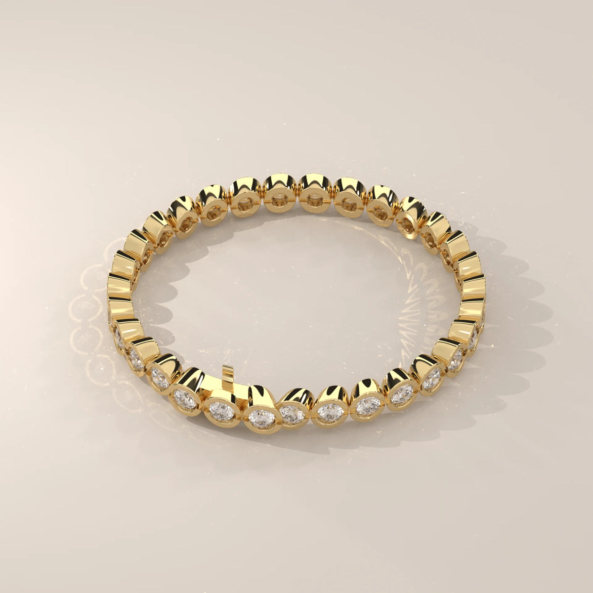 A classic 14k gold tennis bracelet with oval diamonds.