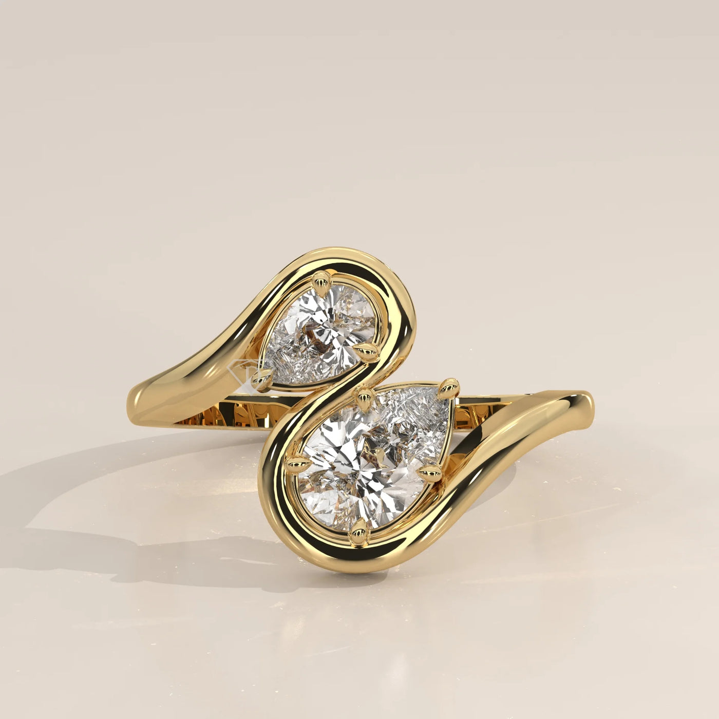 Yellow gold bypass ring with two pear-cut diamonds