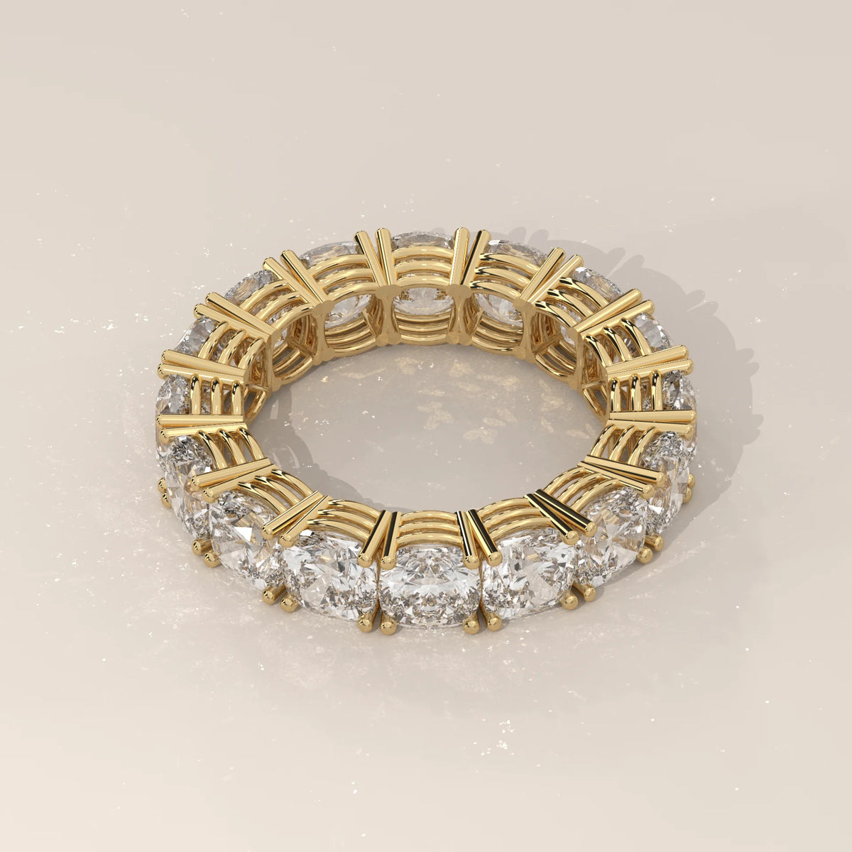 Chunky Cushion Square Diamond Eternity Ring with Bold Claws in yellow gold, shown on a plain background.