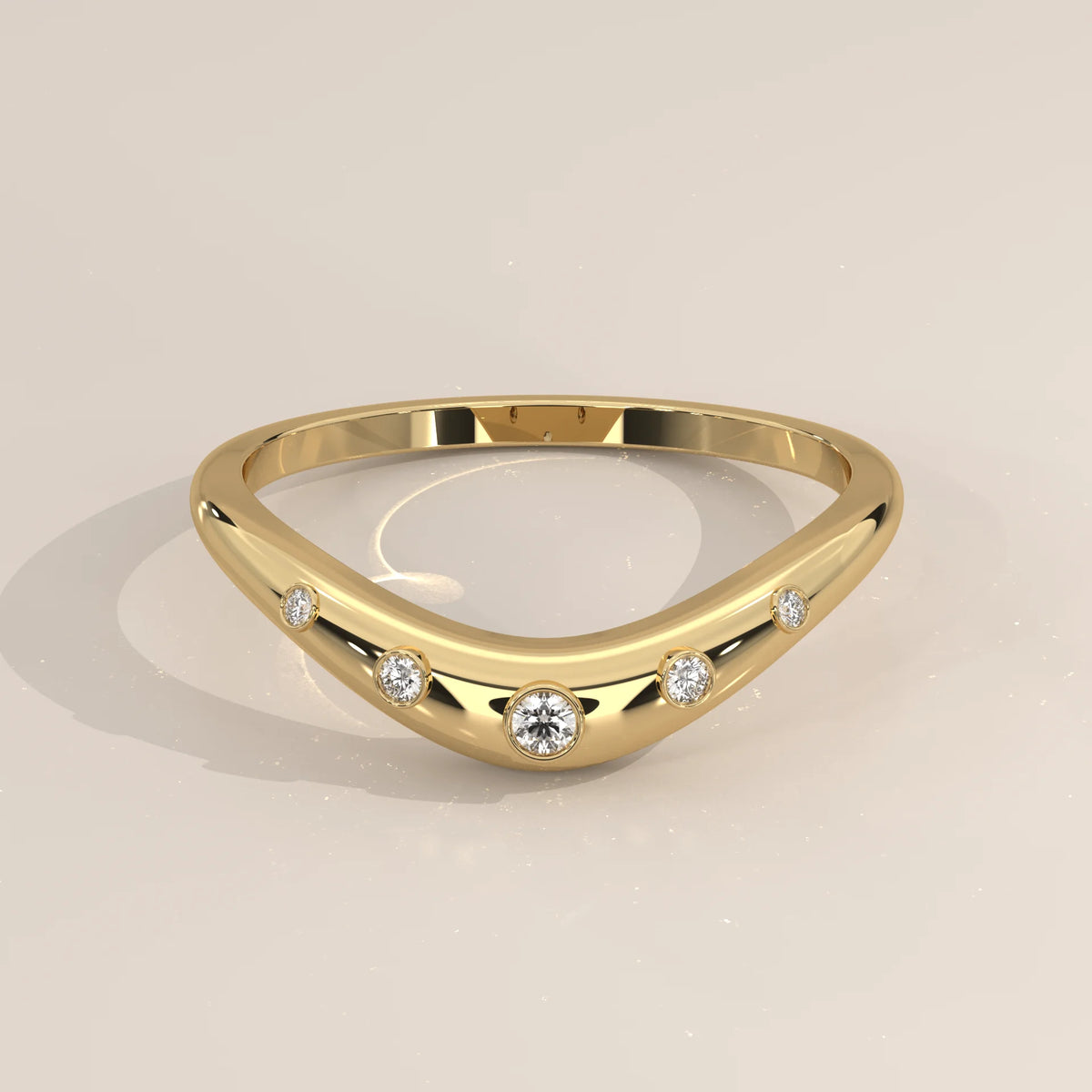 Curved Chevron Band with Five Graduated Bezel Diamonds in yellow gold, shown from the front.