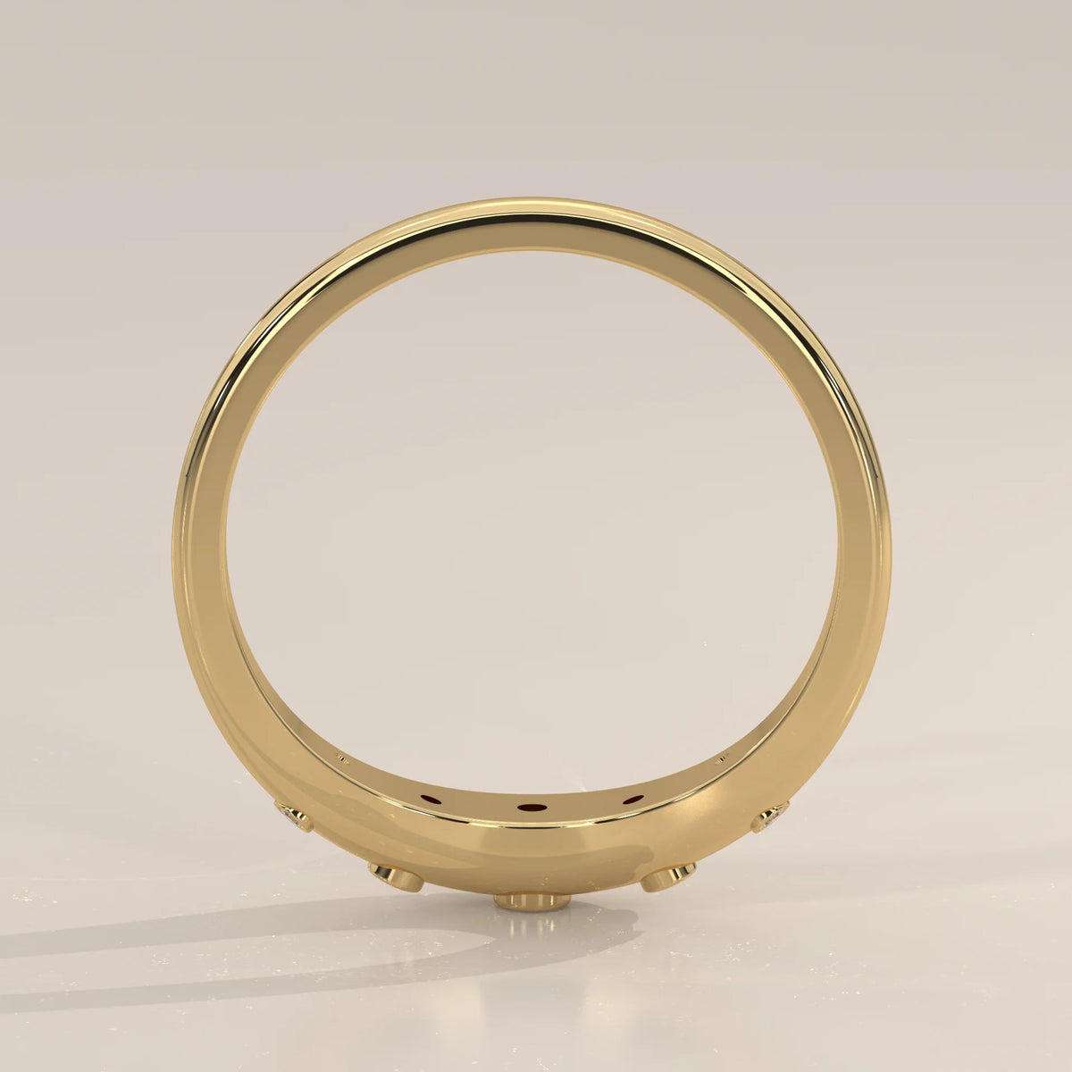 Curved Chevron Band with Five Graduated Bezel Diamonds in yellow gold, shown from the side.