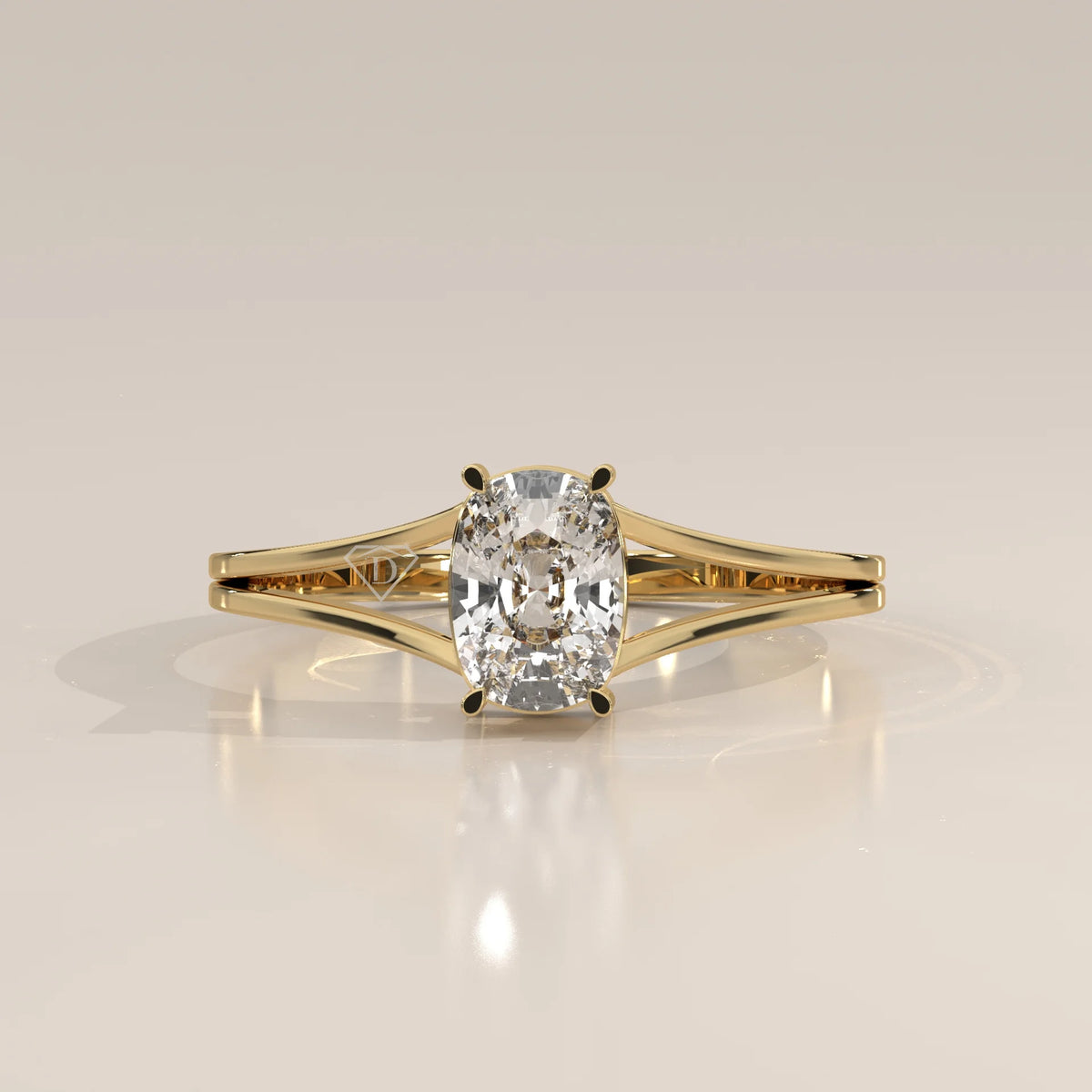 A 14k yellow gold ring with a prominent cushion-cut diamond.