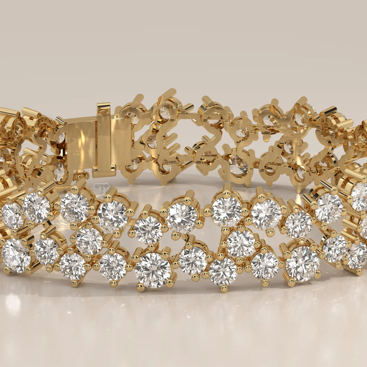 A close-up view of a dazzling 14k yellow gold tennis bracelet with multiple rows of sparkling diamonds.