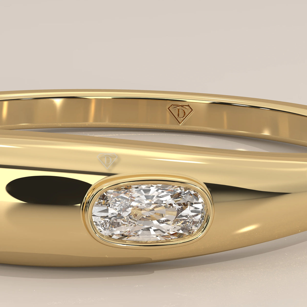 Domed Gold Band with a Flush Set Elongated Cushion Diamond in yellow gold, photographed head-on.