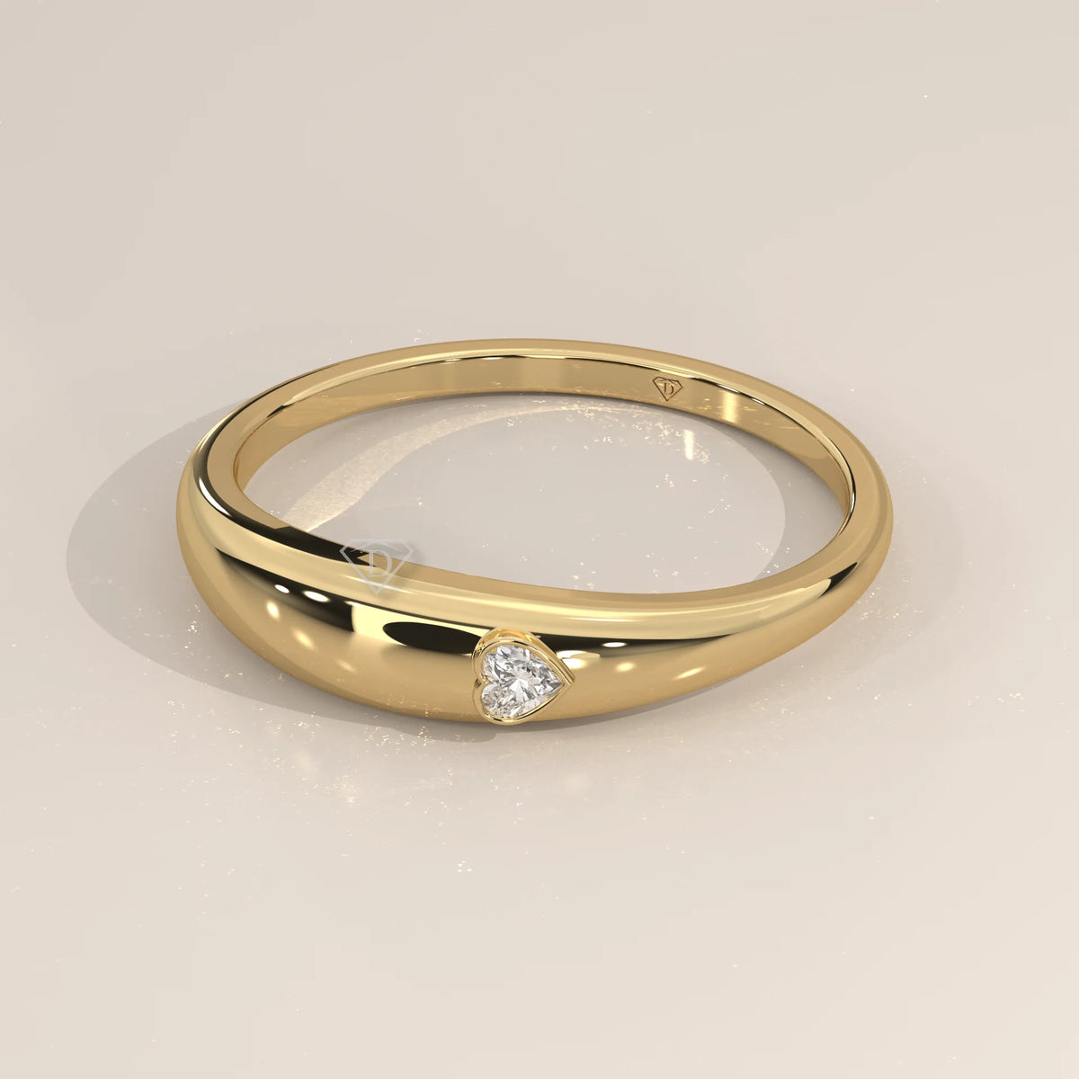 Domed Gold Band with a Small Flush Set Heart Diamond in yellow gold, front view on a plain background.