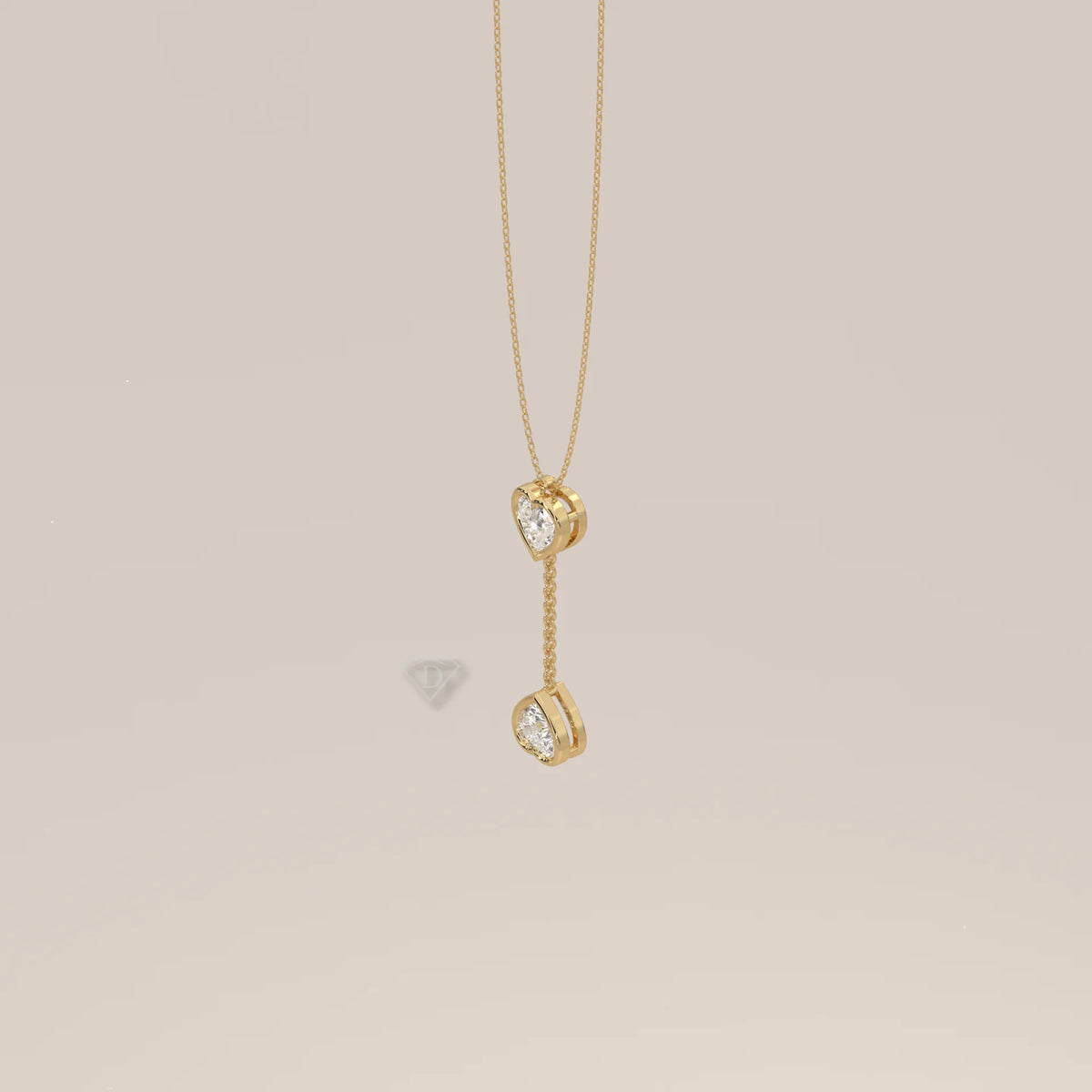 Double Bezel Heart Lab Grown Diamond Lariat Drop Pendant in yellow gold, shown at an angle.