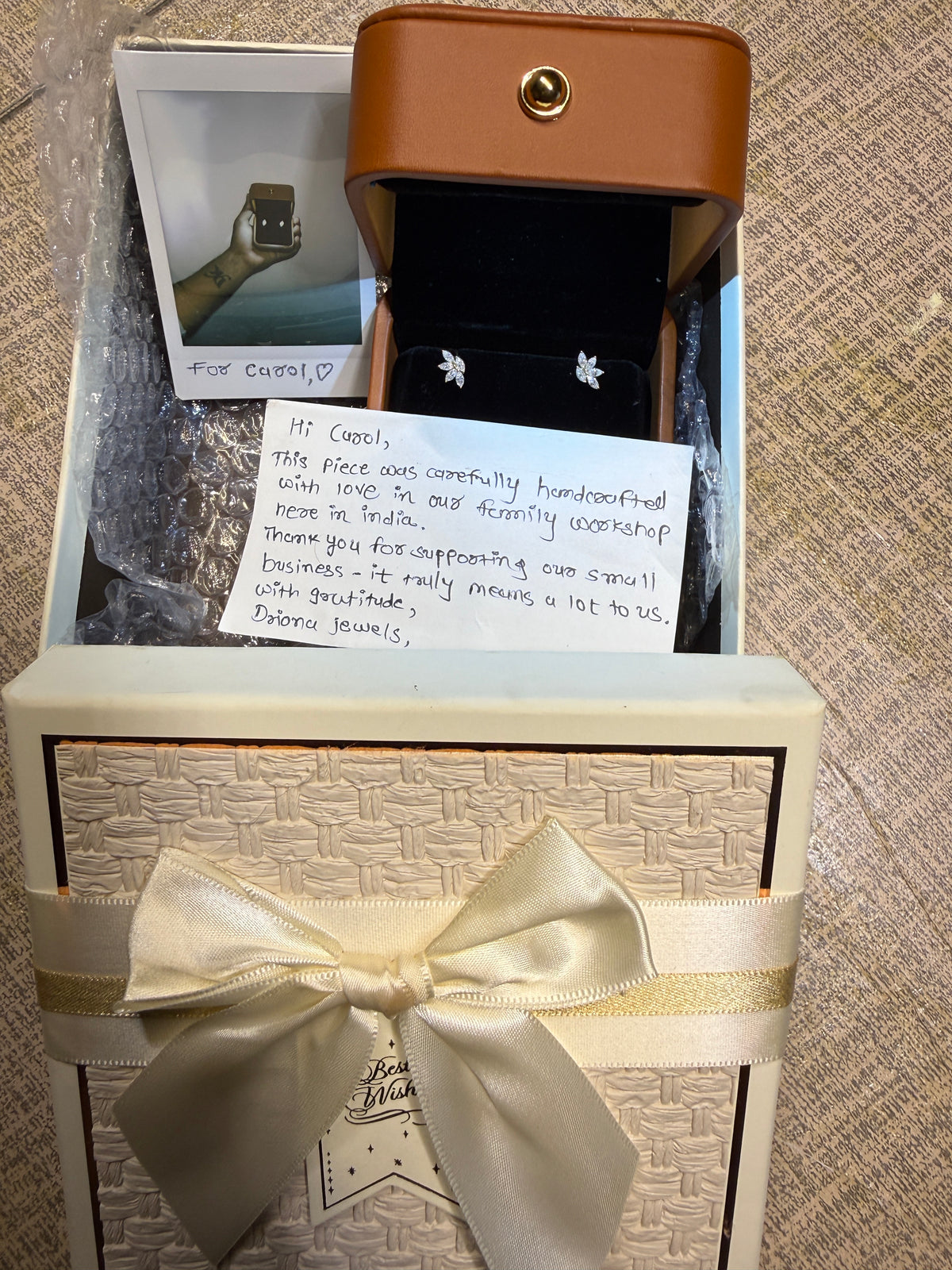 Driona Jewels gift box with polaroid photo of the piece and a handwritten thank you note