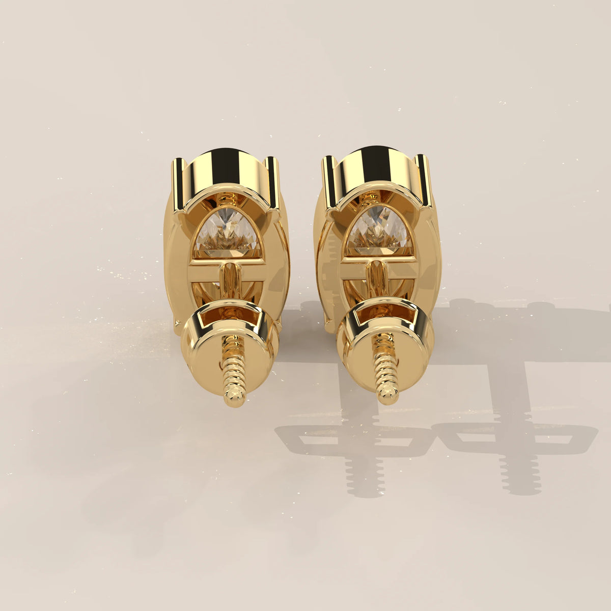 Pair of 14k gold stud earrings with diamonds.