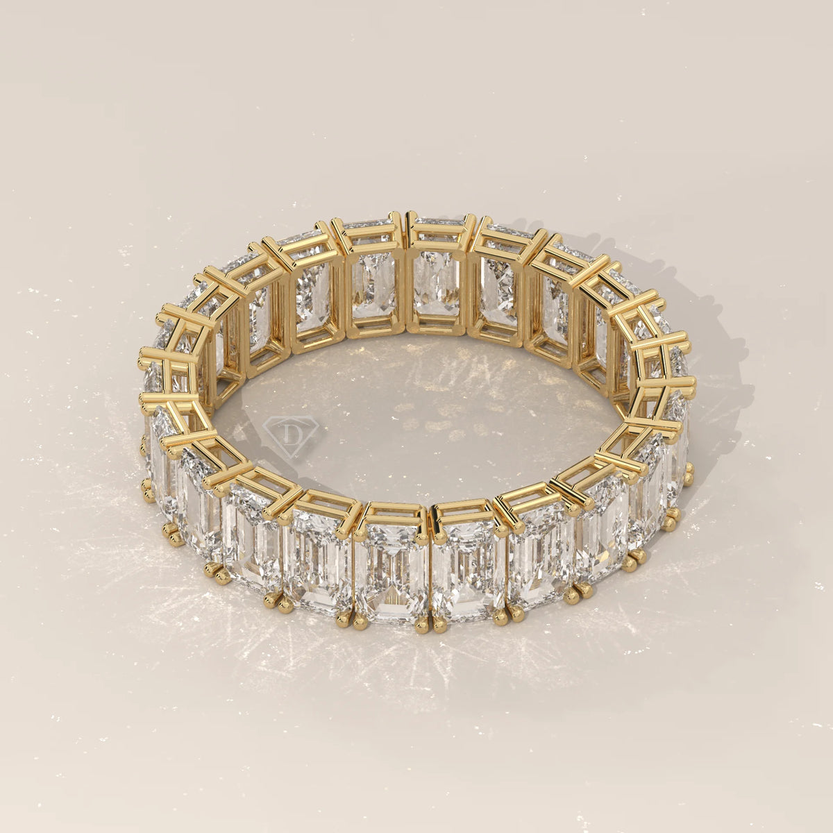 East West Emerald Cut Diamond Eternity Band in Solid Gold in yellow gold, shown at an angle.