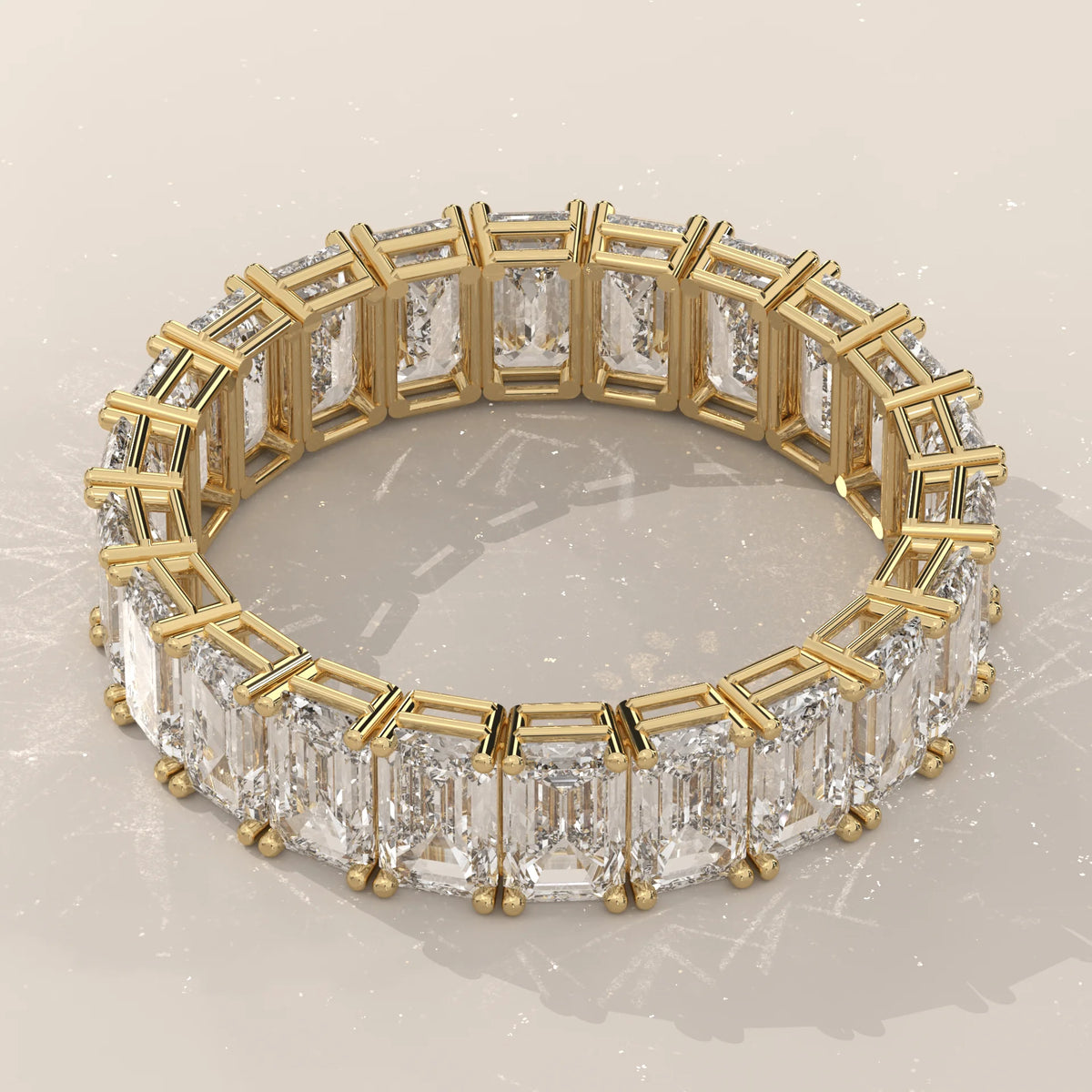 East West Emerald Cut Diamond Eternity Band in Solid Gold in yellow gold, product photograph on a plain background.