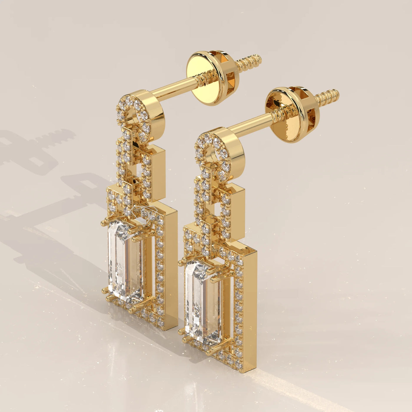 Three-Quarter View: Emerald Cut Diamond Dangle Earrings with Prong Setting in Yellow Gold – Lab Grown – Driona Jewels