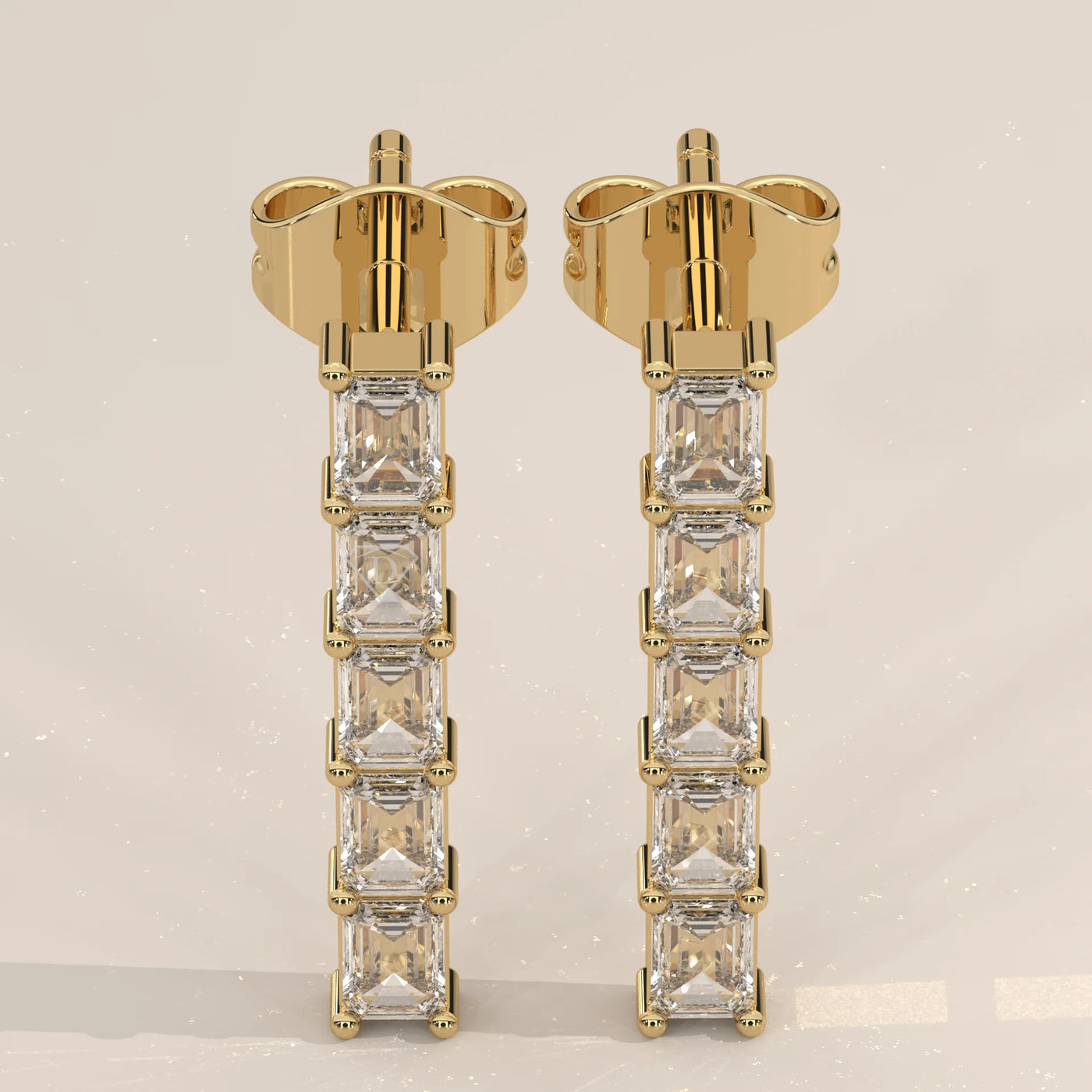 Pair Front View: Emerald Cut Diamond Drop Earrings with Prong Setting in Yellow Gold – Lab Grown – Driona Jewels