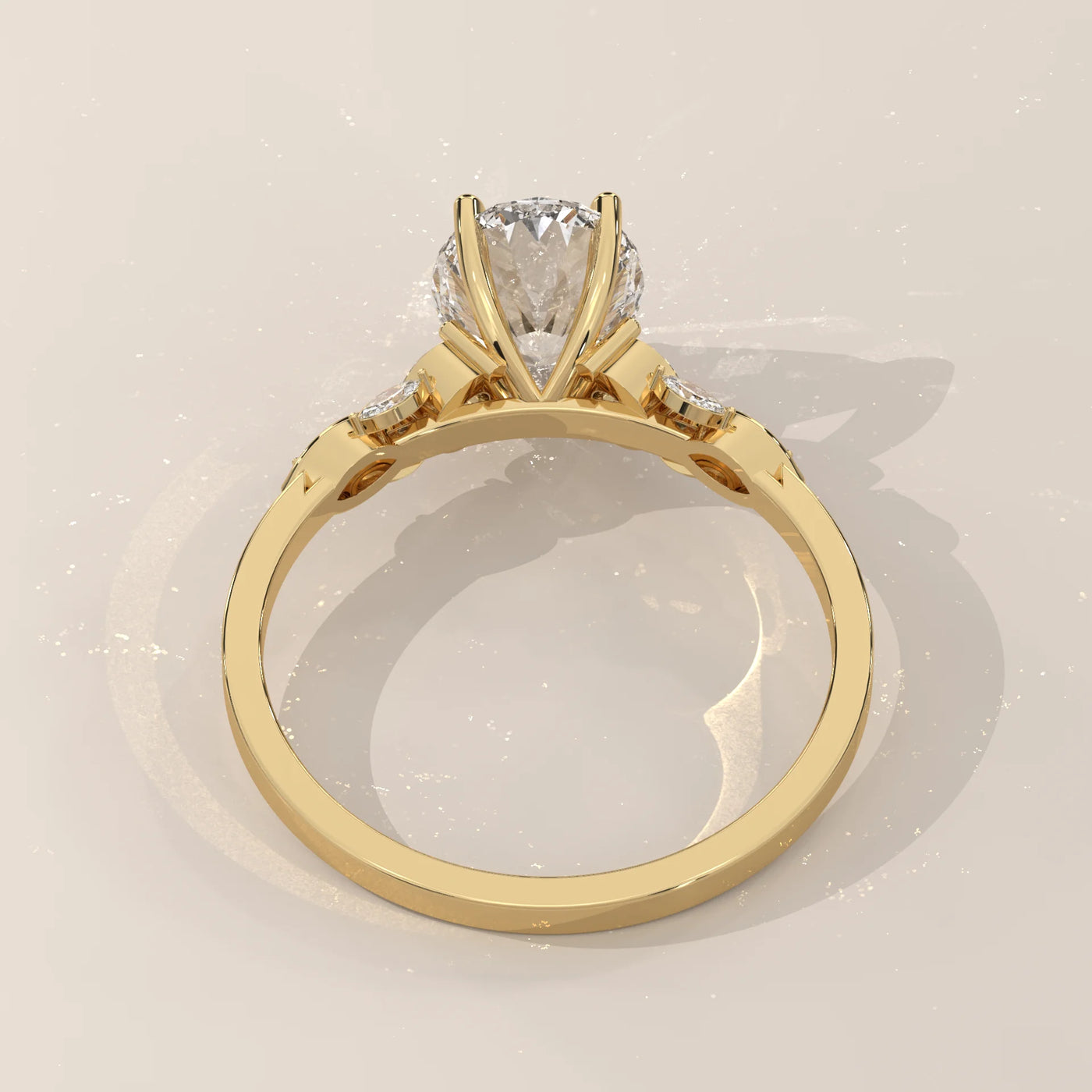 A radiant diamond engagement ring set in lustrous 14k yellow gold.