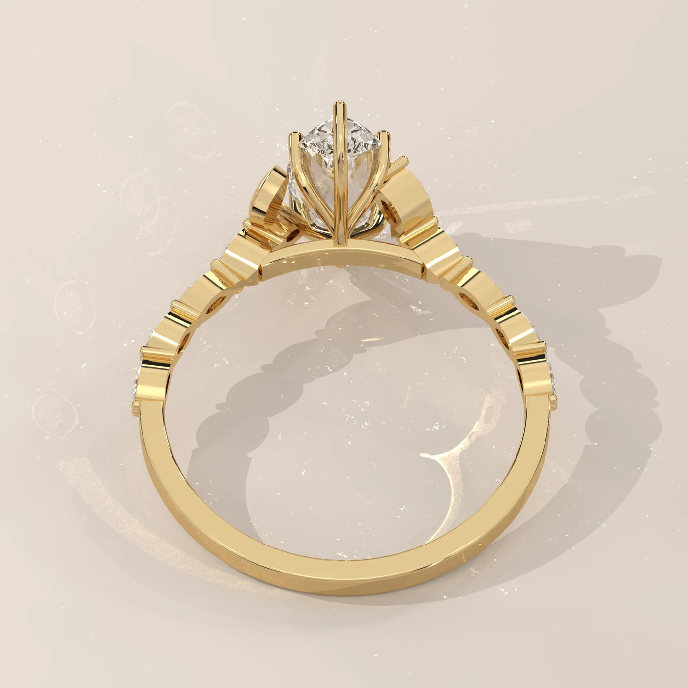 Yellow gold engagement ring with a marquise diamond and accent stones.