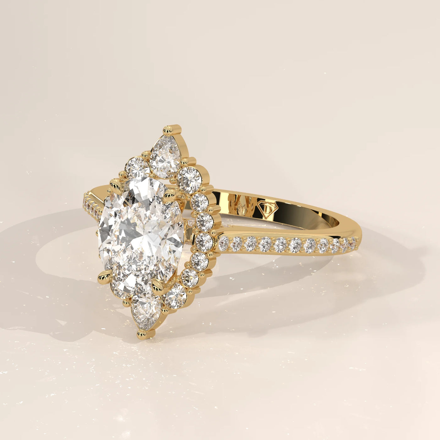 Gold ring with an oval diamond surrounded by smaller diamonds.