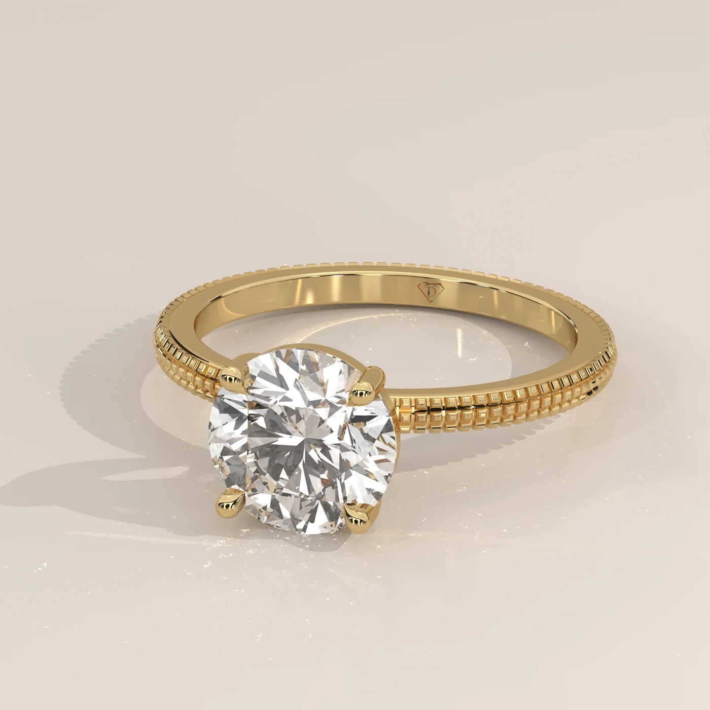 A classic yellow gold engagement ring with a round brilliant cut diamond.