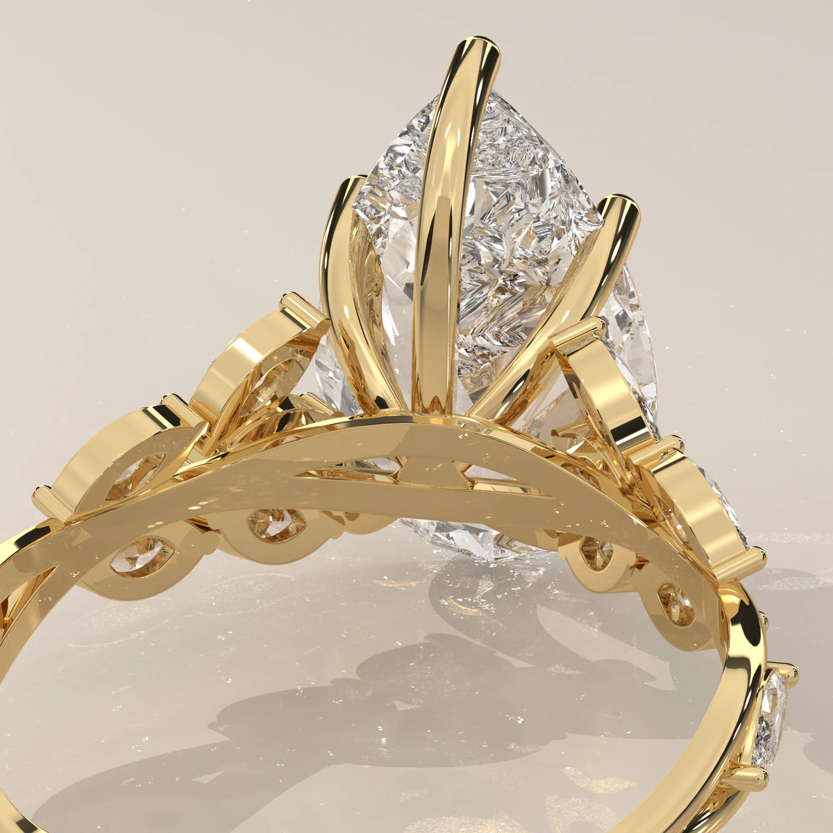 Fiana 5 Carat Pear Lab Grown Diamond Ring, Marquise Vine Band in yellow gold, shown at an angle.