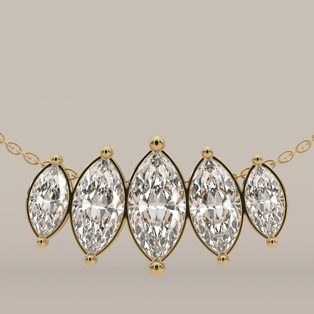 Five Graduated Marquise Lab Grown Diamond Bar Pendant in yellow gold, front view on a plain background.
