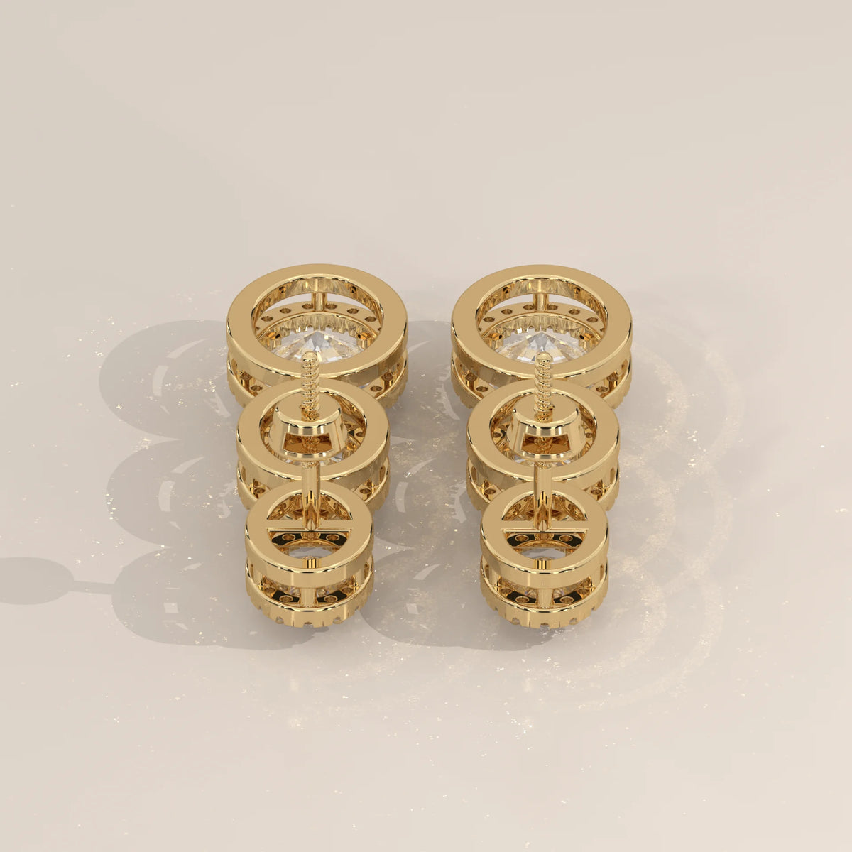 Graduated Three Oval Halo Lab Grown Diamond Drop Earrings in yellow gold, side profile view.