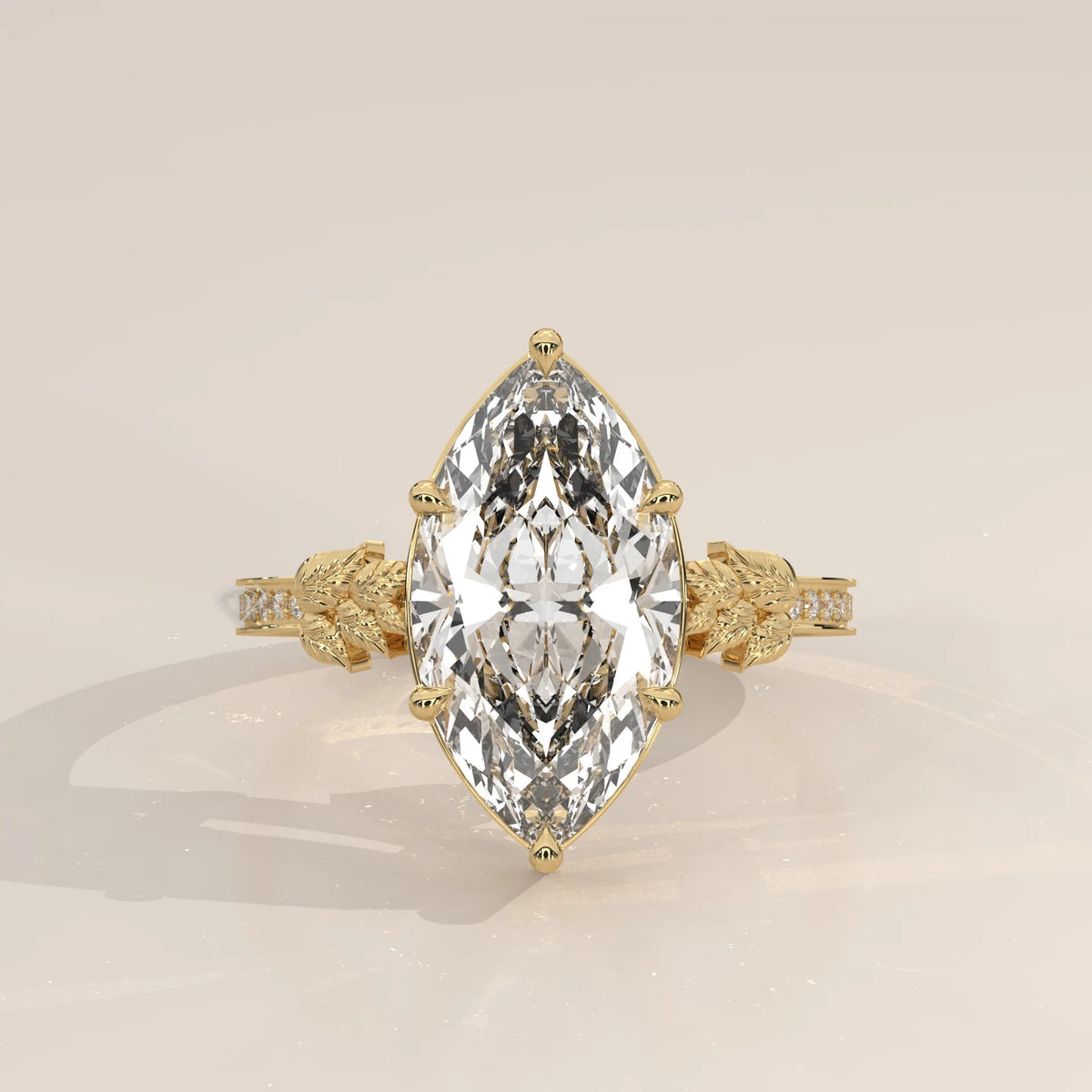 Gronie 5 Carat Marquise Lab Grown Diamond Ring, Carved Leaf Shoulders in yellow gold, shown from the front.