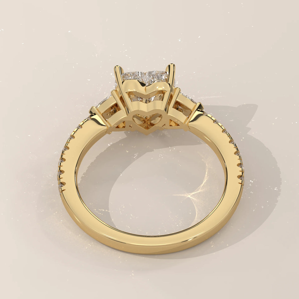 Heart Lab Grown Diamond Three Stone Ring with Trillion Sides in yellow gold, side profile view.