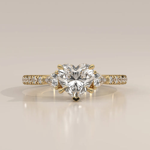 Heart Lab Grown Diamond Three Stone Ring with Trillion Sides in yellow gold, photographed head-on.