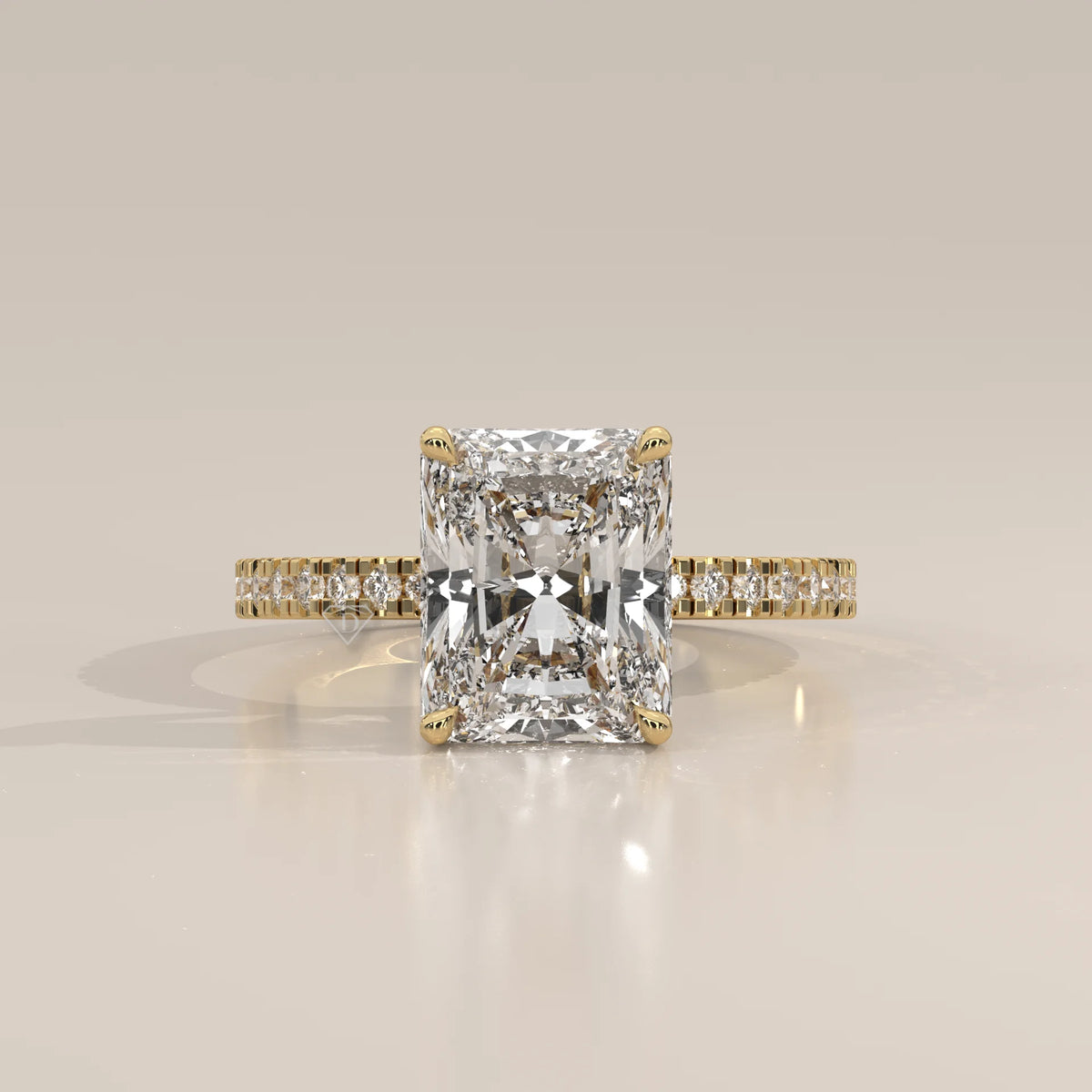 Ivory 5 Carat Radiant Lab Grown Diamond Ring, Hidden Halo Pave Band in yellow gold, photographed head-on.