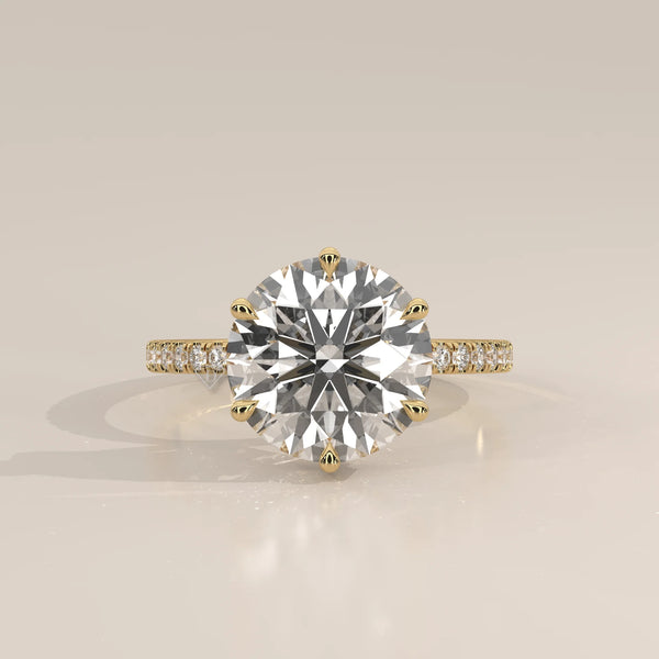 Jlina 5 Carat Round Lab Grown Diamond Ring, Six Claw Hidden Halo in yellow gold, photographed head-on.