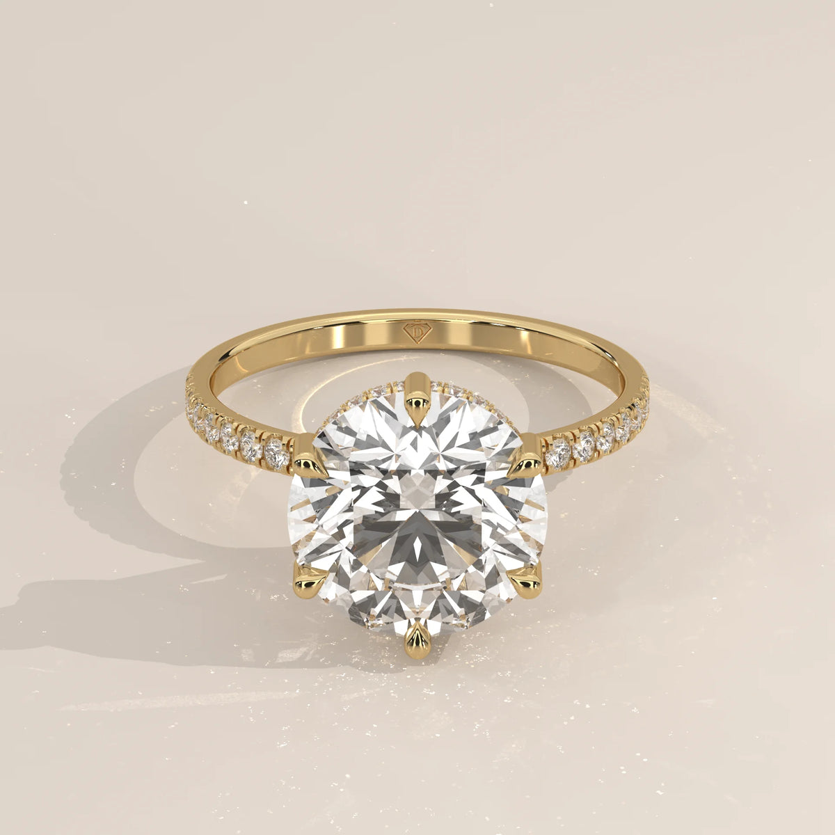 Jlina 5 Carat Round Lab Grown Diamond Ring, Six Claw Hidden Halo in yellow gold, shown from the front.