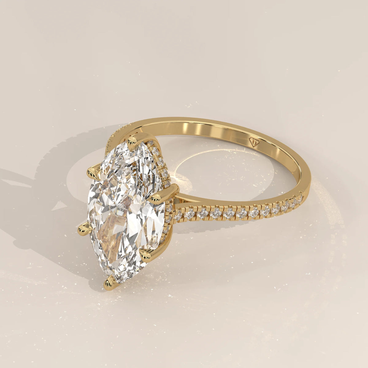 Kalesya 5 Carat Marquise Lab Grown Diamond Ring, Hidden Halo Pave in yellow gold, shown at an angle.