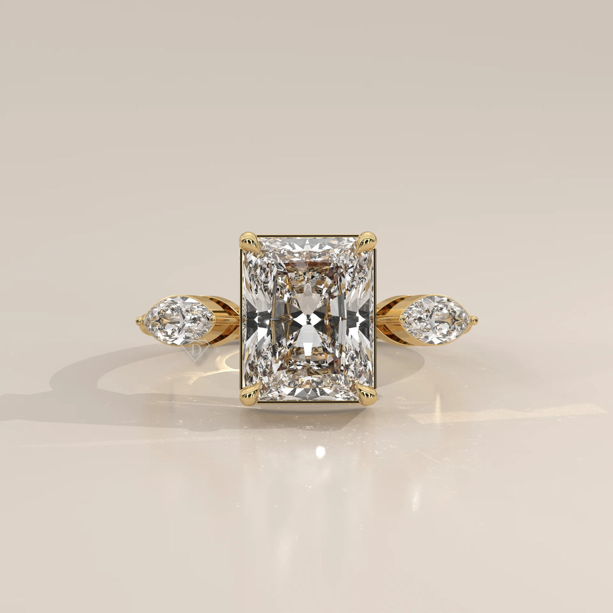 Krace 5 Carat Radiant Lab Grown Diamond Ring, Marquise Three Stone in yellow gold, photographed head-on.