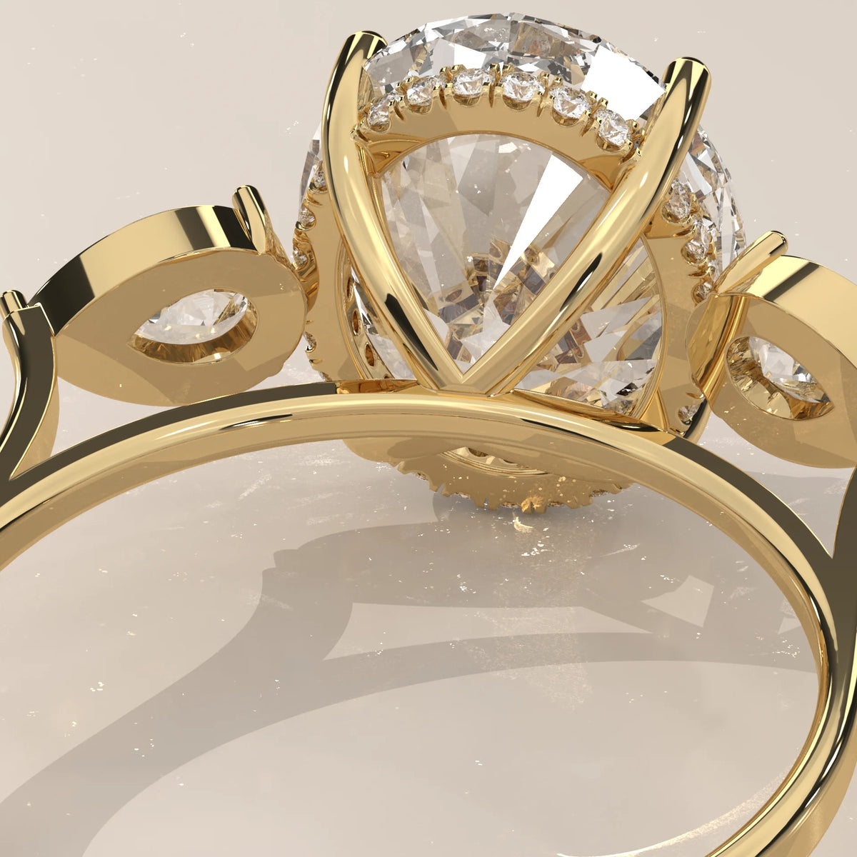 Lerrayki 5 Carat Oval Lab Grown Diamond Three Stone Ring, Pear Sides in yellow gold, photographed at a three-quarter angle.