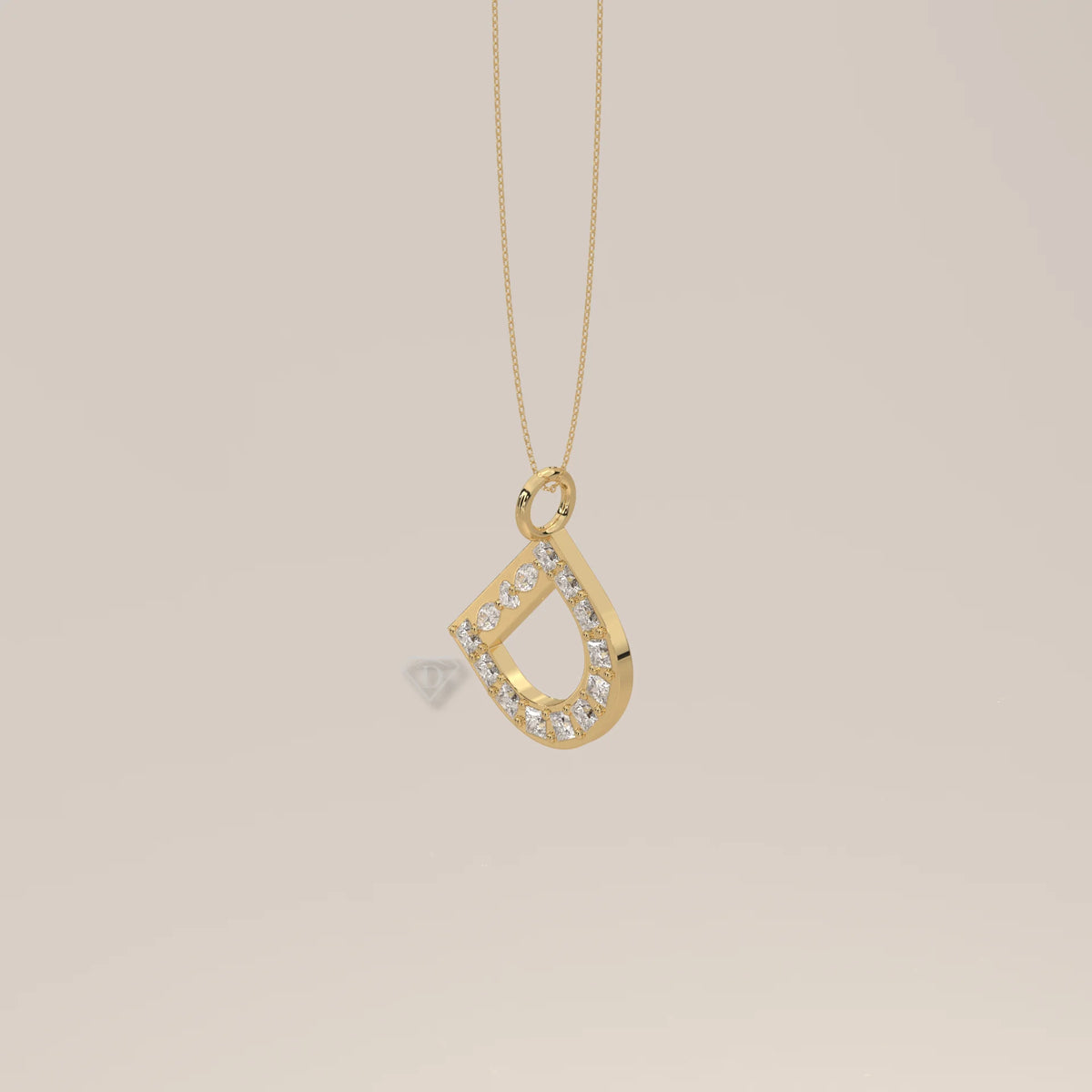 Letter D Initial Pendant with Princess Cut Lab Grown Diamonds in yellow gold, shown at an angle.