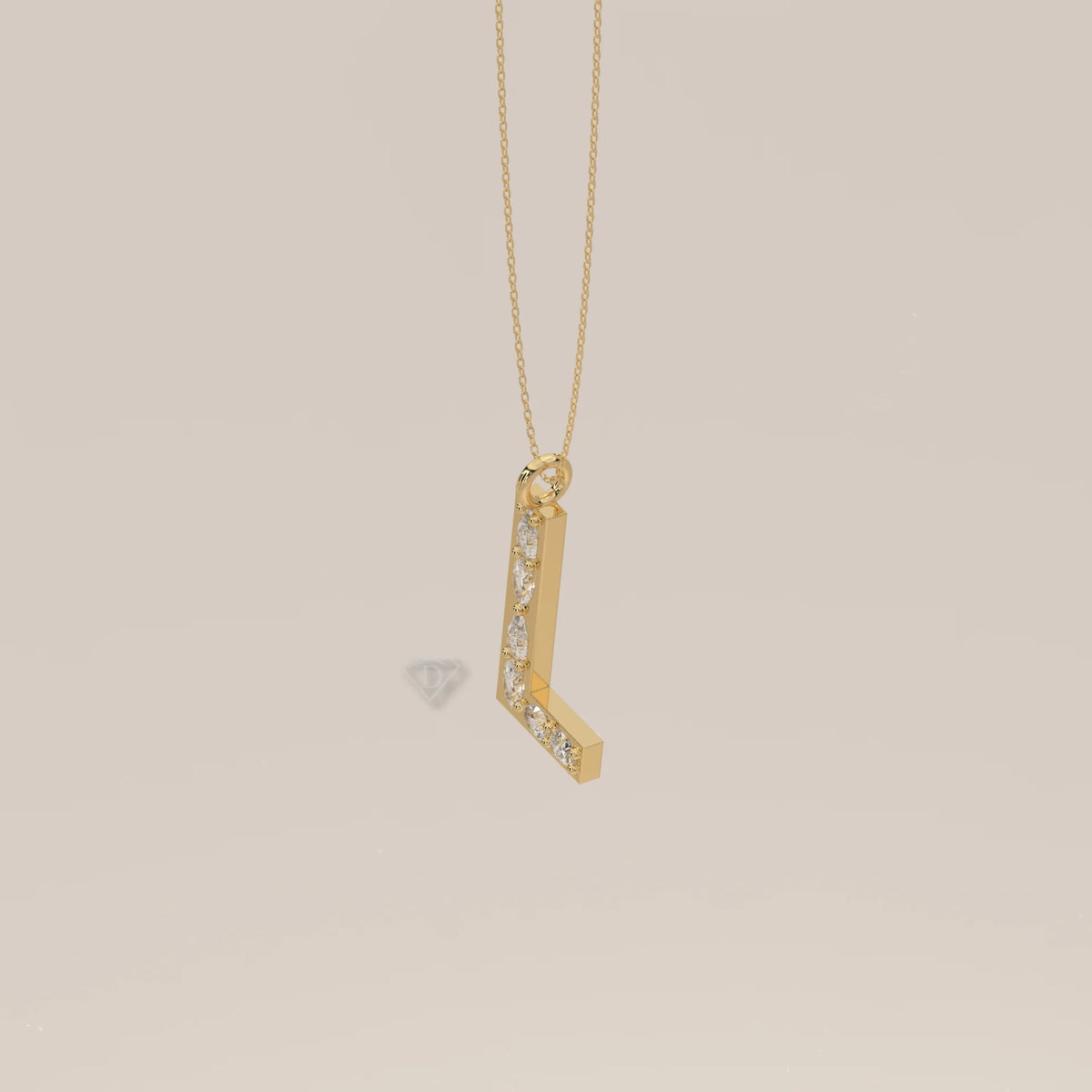 Letter L Initial Pendant with Pear Shaped Lab Grown Diamonds in yellow gold, shown at an angle.