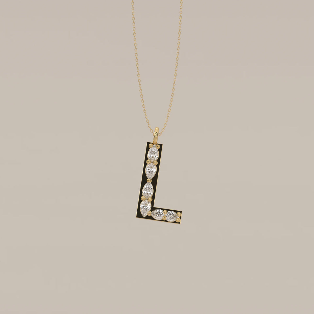 Letter L Initial Pendant with Pear Shaped Lab Grown Diamonds in yellow gold, shown from the front.