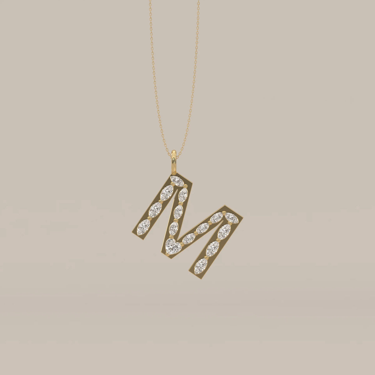 Letter M Initial Pendant with Marquise Lab Grown Diamonds in yellow gold, shown on a plain background.