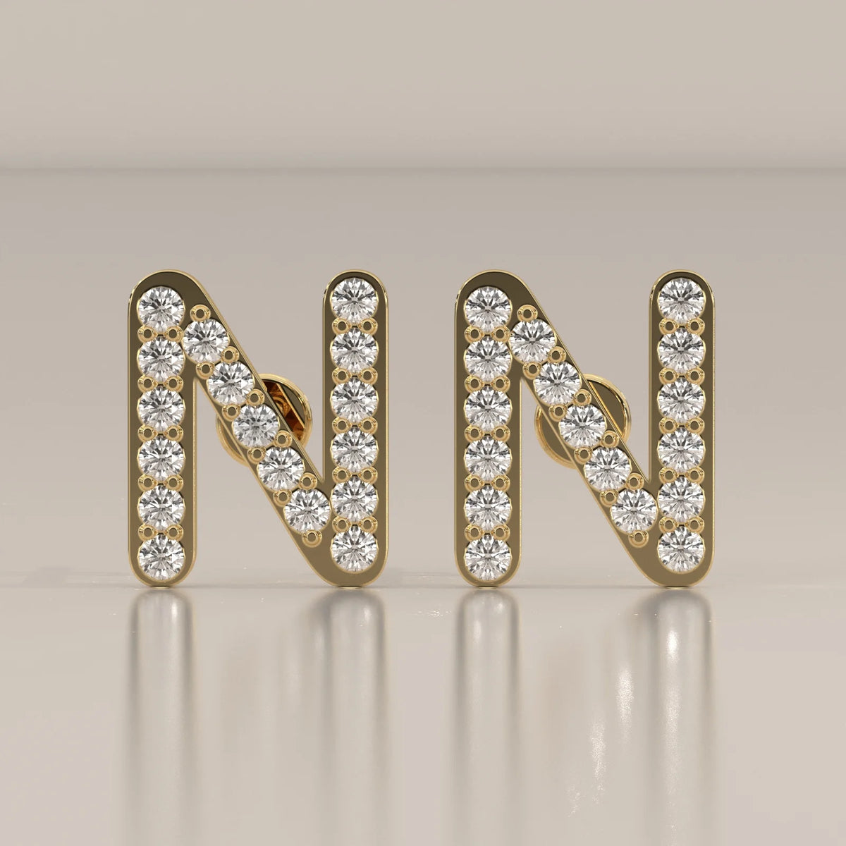 Letter N Initial Pave Lab Grown Diamond Stud Earrings in yellow gold, shown from the front.