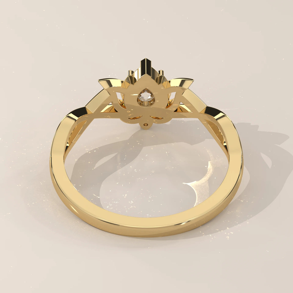 A delicate gold ring with a lotus-inspired setting holding a diamond.