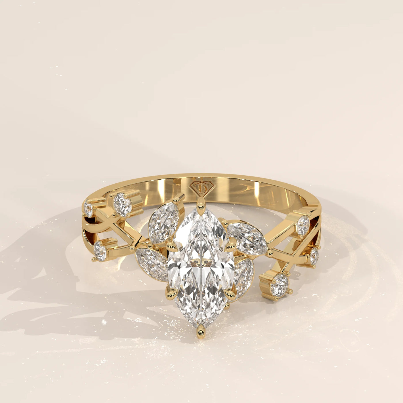 Yellow gold engagement ring featuring a large marquise diamond surrounded by smaller stones.
