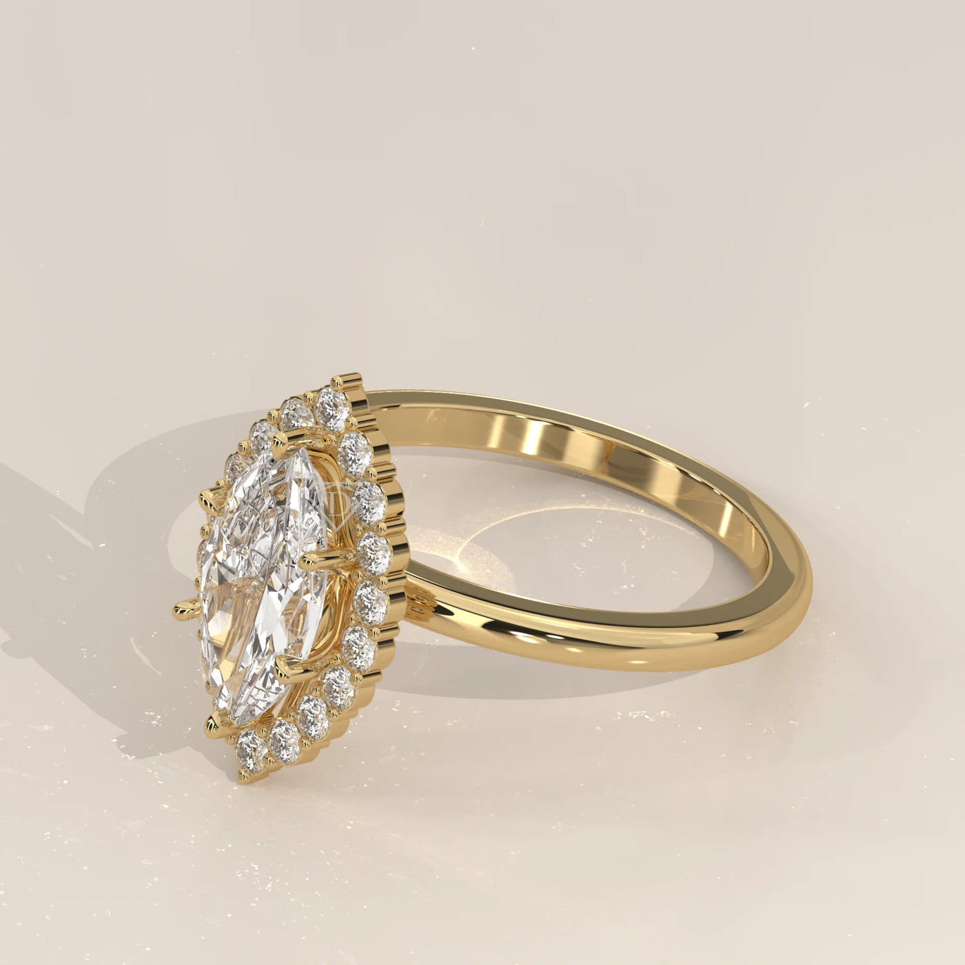 Gold ring with a marquise-cut diamond surrounded by smaller stones.