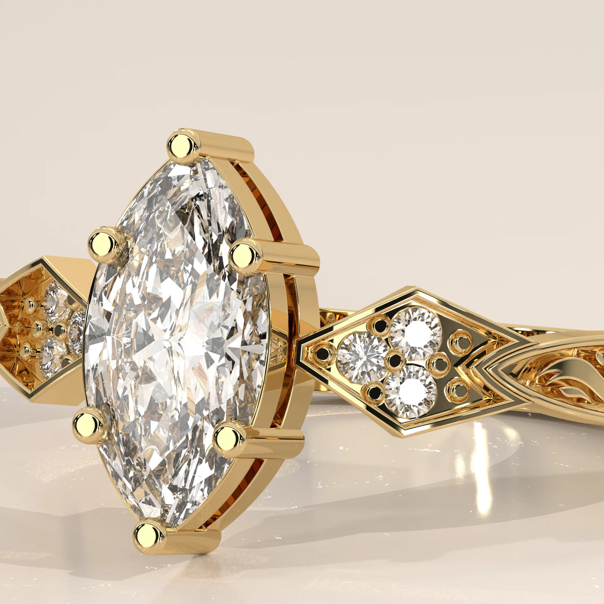 Close-up of a yellow gold ring with a large marquise-cut diamond and intricate detailing.