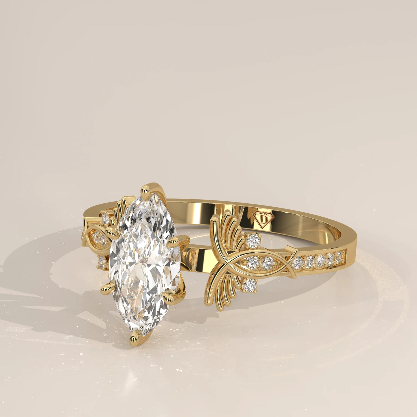 Yellow gold ring with a large marquise-cut diamond and smaller accent stones.