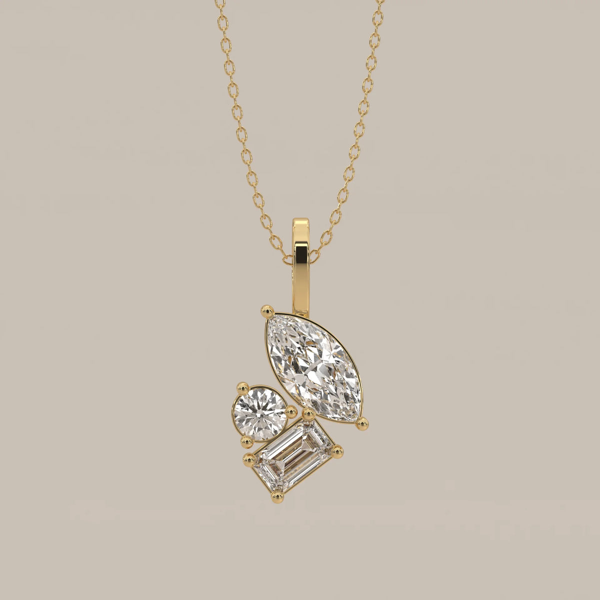 Marquise, Emerald and Round Lab Grown Diamond Cluster Pendant in yellow gold, shown from the front.