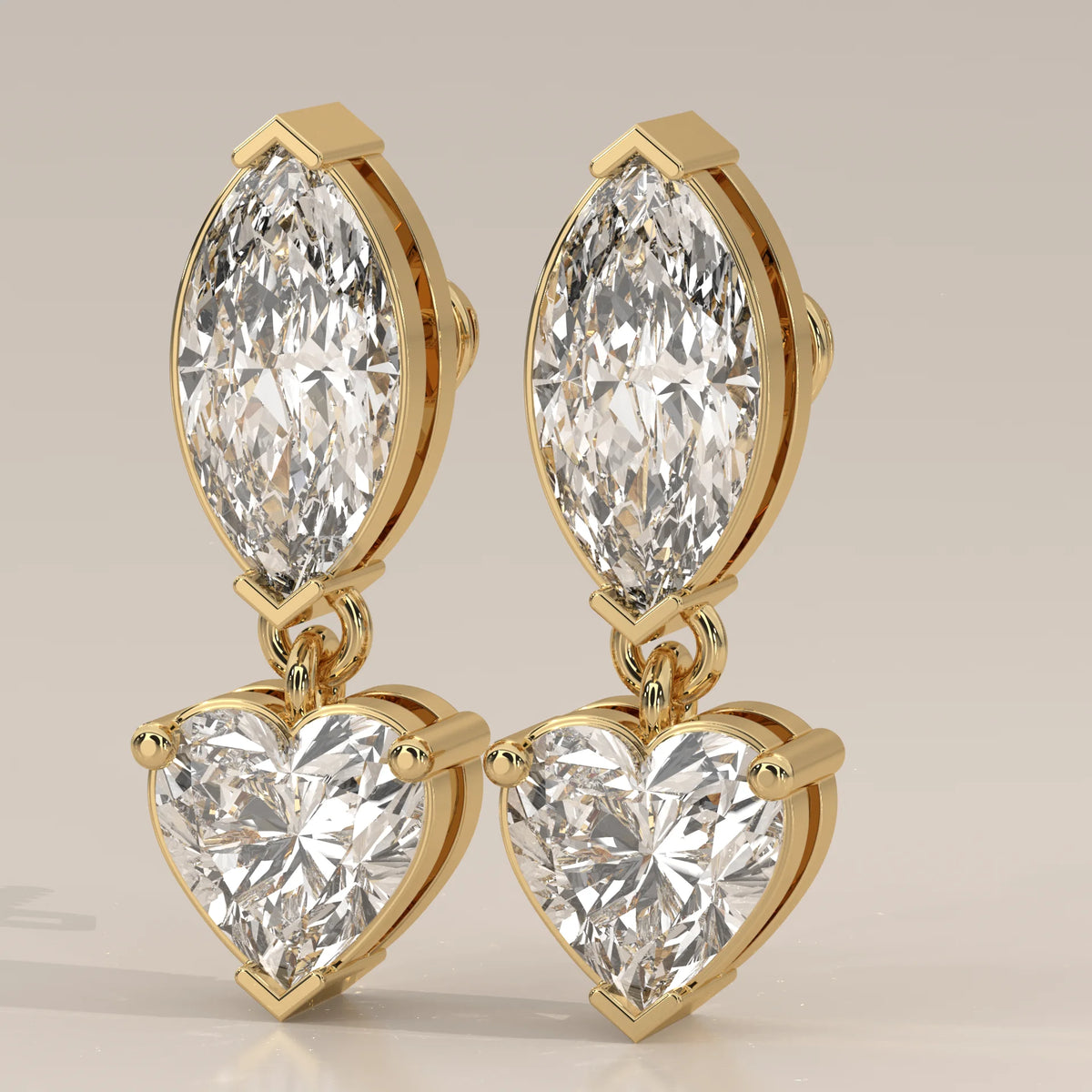 Marquise and Heart Lab Grown Diamond Two Stone Drop Earrings in yellow gold, front view on a plain background.