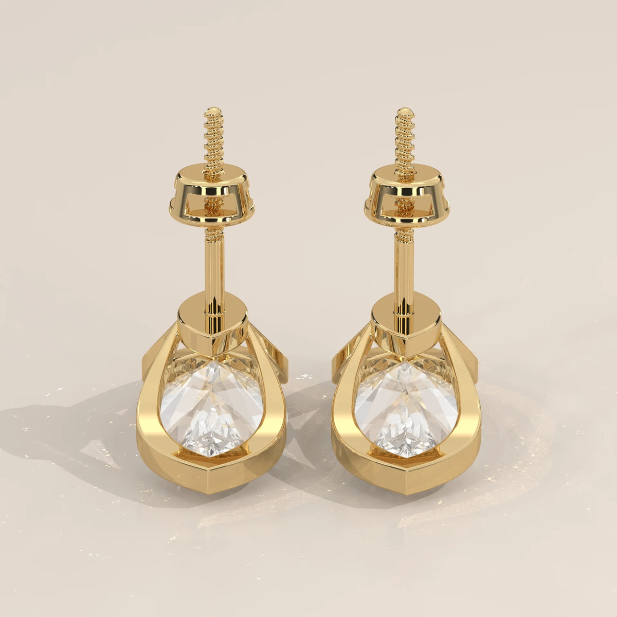 Marquise Lab Grown Diamond Studs with Pointed Tip Bezels in yellow gold, shown on a plain background.