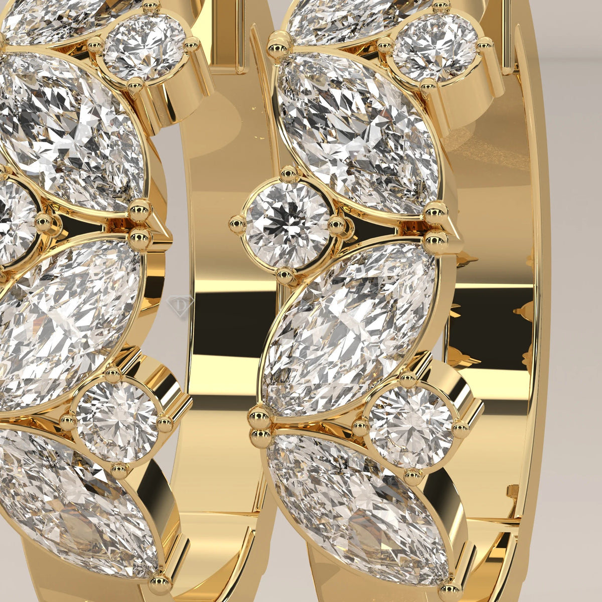 Marquise and Round Lab Grown Diamond Hoops in a Leaf Pattern in yellow gold, shown on a plain background.